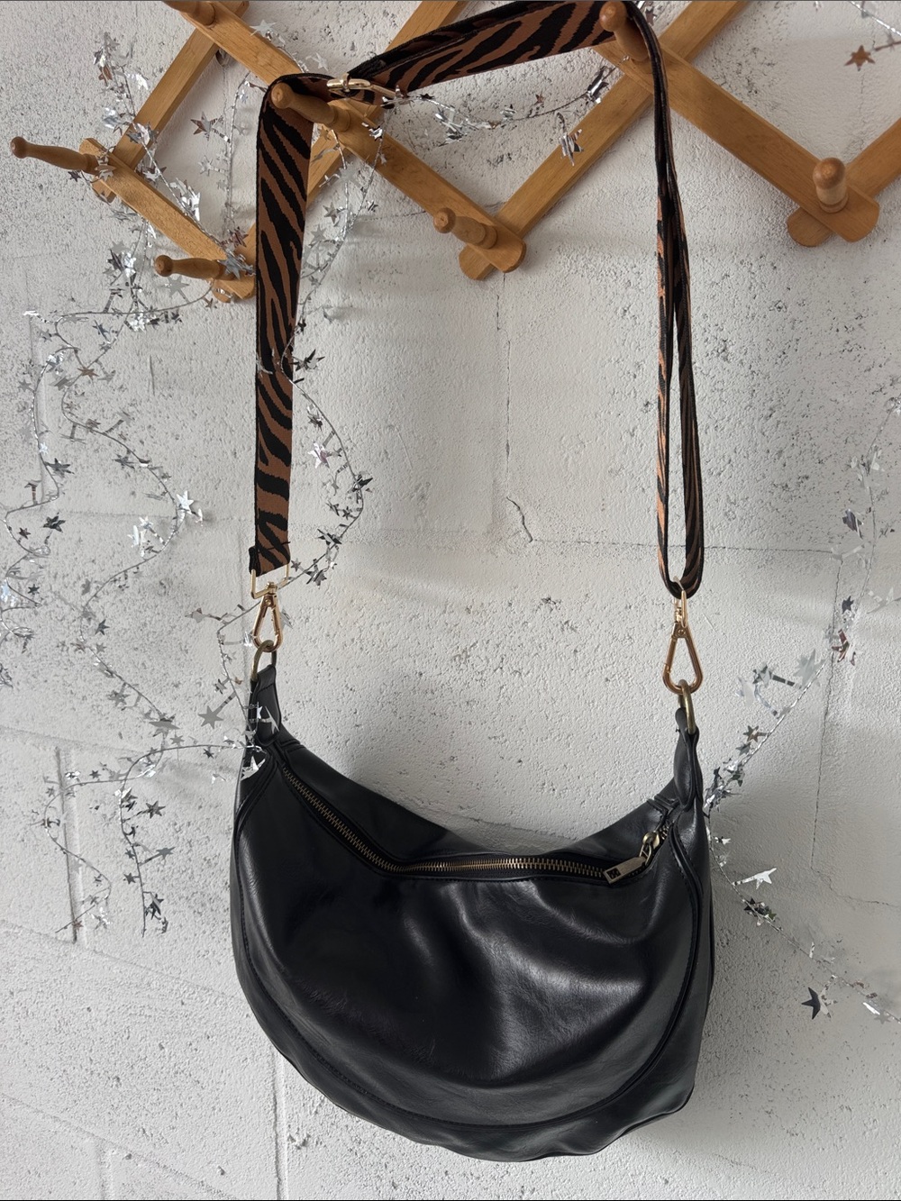 Faux black leather saddle crossbody bag